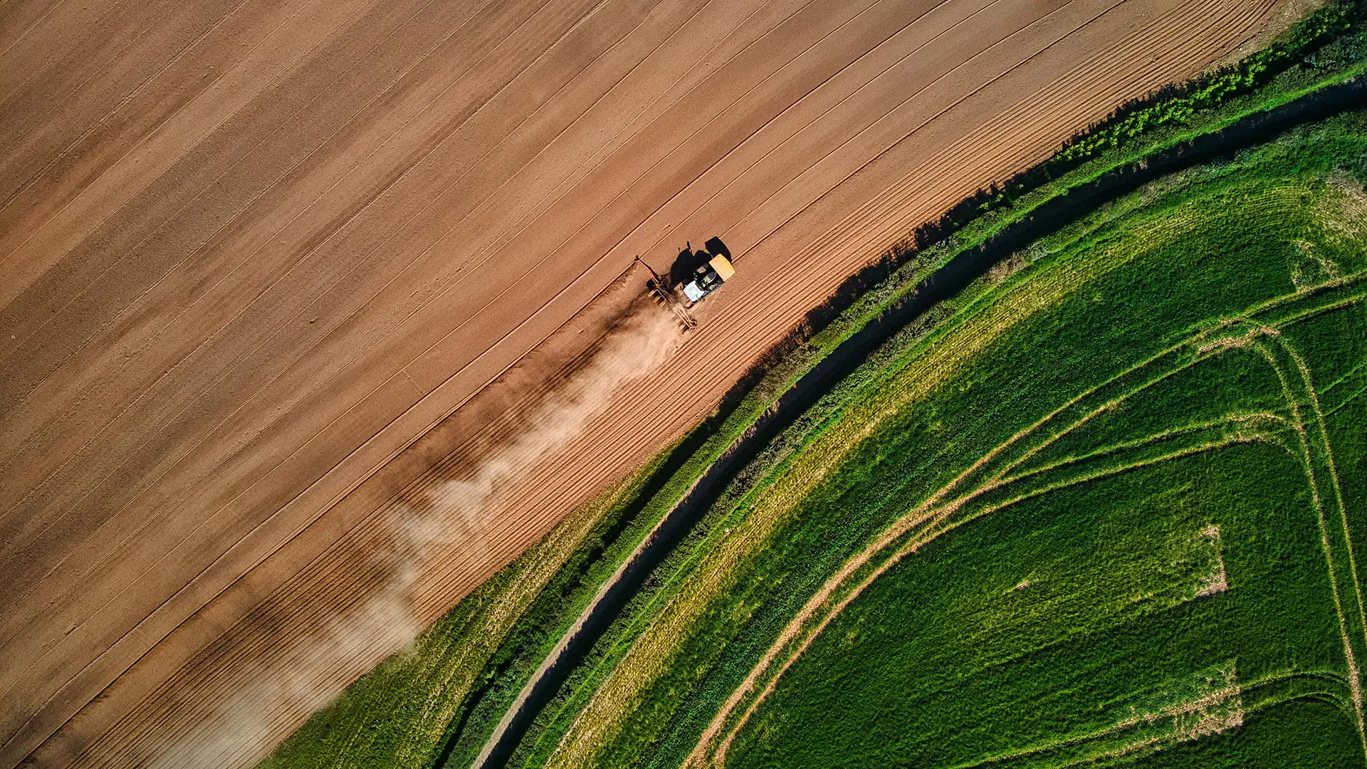 Aerial view of tractor in field