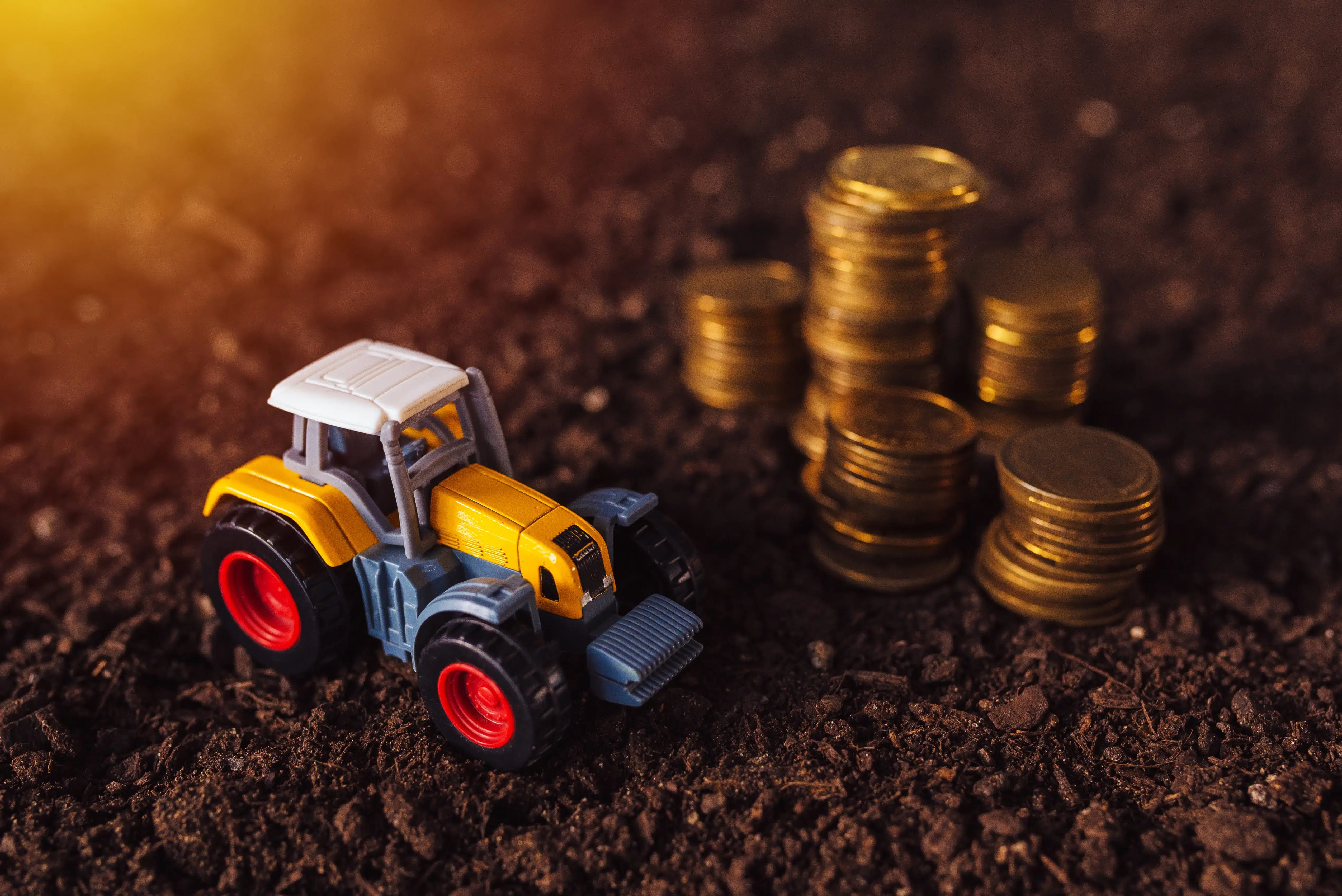 toy tractor with coins